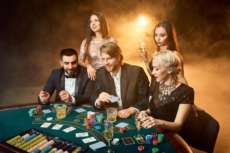 Live dealer conducting a Free Bet Blackjack round with multi-camera studio setup